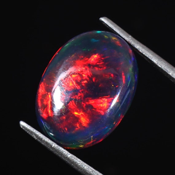 AAAAA Grade Natural Black Opal Cabochon Gemstone+Welo Fire Black Opal+ Handmade Oval Shape Opal+October Birthstone Gemstone, Size 5x7 MM.
