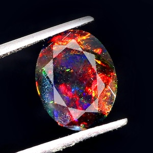 AAAAA-kvalitet naturlig svart opal cabochon ädelsten + Welo eld svart opal + fasetterad oval form opal + oktober födelsesten ädelsten, storlek 7x5 MM. bild 3