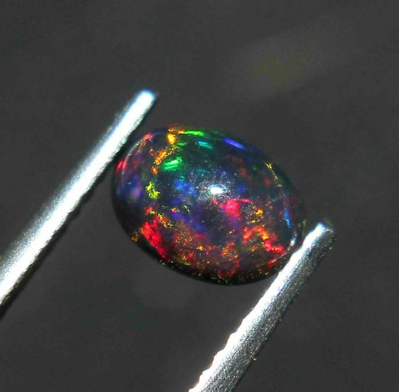 AAAAA Grade Natural Black Opal Cabochon GemstoneWelo Fire Black Opal Handmade Oval Shape OpalOctober Birthstone Gemstone, Size 7x5 MM. image 2