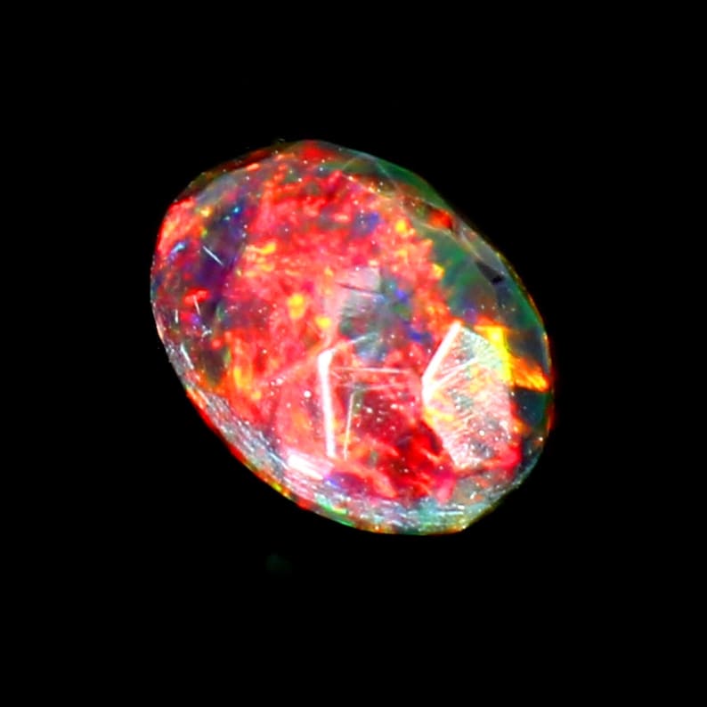 AAAAA Grade Natural Black Opal Cabochon Gemstone+Welo Fire Black Opal+ Faceted Oval Shape Opal+October Birthstone Gemstone, Size 7x5 MM. image 3