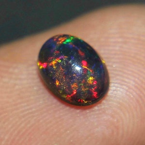 AAAAA Grade Natural Black Opal Cabochon GemstoneWelo Fire Black Opal Handmade Oval Shape OpalOctober Birthstone Gemstone, Size 7x5 MM. image 3