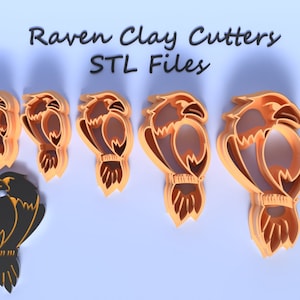 May include: Five orange plastic raven clay cutters of different sizes, with a black raven cutter in the centre for size comparison. The text "Raven Clay Cutters STL Files" is printed above the cutters. A ruler is shown with the measurement "0.39 in 10 mm".