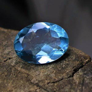 7.8 Carat Natural Blue Topaz Oval Shape Faceted Loose Gemstone for Making Jewelry 16*12 mm