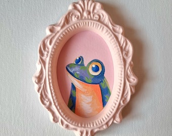 Glücklicher Tim, Wunderfrosch • Acrylgemälde • Gemälde zum Aufhängen an der Wand • Rosa Rahmen • Mini-Geschenk • Kleines Geschenk • Süßes Gemälde