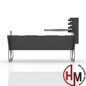 May include: A black metal fire pit with a side shelf and a grill grate. The fire pit has a rectangular shape and is designed for outdoor use.