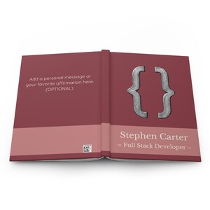 May include: Open book with a maroon cover. The left side has text that reads "Add a personal message or your favourite affirmation here. (OPTIONAL)." The right side has a silver bracket symbol and the name "Stephen Carter - Full Stack Developer -."