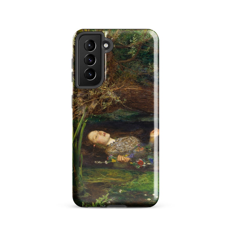May include: A phone case featuring a painting of a woman floating in water, surrounded by flowers and greenery. The artwork depicts a serene scene with a natural, artistic aesthetic. The case is black with a camera module.