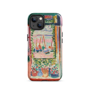 May include: A phone case featuring a painting of a window with a view of boats in a harbour. The window is framed in green and the boats are painted in bright colours. The case is made of durable plastic and has a matte finish.