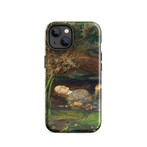 May include: A phone case featuring a painting of a woman floating in water, surrounded by greenery. The artwork depicts a woman with long hair and a floral dress, with a dark background and a serene atmosphere.