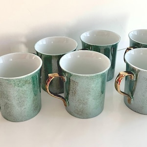 Conjunto de 6 canecas de café vintage HIRAKI japonesas em verde iridescente com alças douradas.