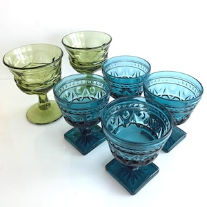Pair of vintage MCM wine goblet glasses in stunning cornflower / turquoise blue. Viking / federal / thumbprint style with chic square base.