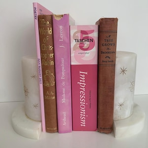Vintage MCM white marble / alabaster / onyx book ends with etched celestial starburst design. Made in Italy