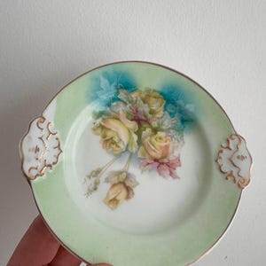 vintage porcelain rose design trinket dish / catch all / cake plate. perfect to hold jewelry, kitchen, as a gift or charming cake plate