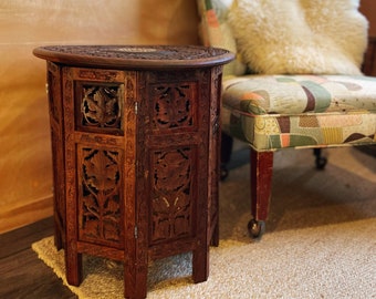 Octagonal hand-carved side table from India with bone inlay