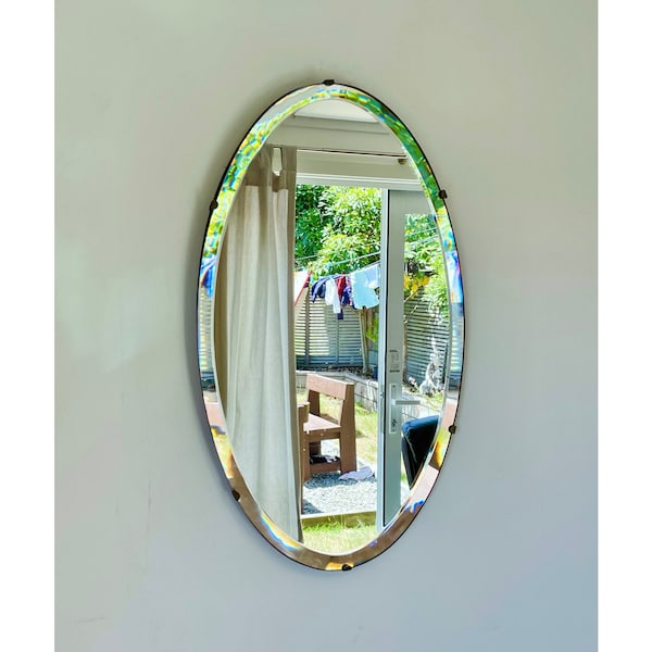 Espejo ovalado Art Déco con bordes biselados