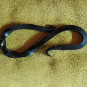 Hand forged bottle opener
