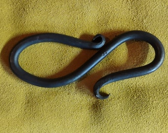 Hand forged bottle opener