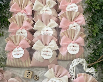 Sac sur mesure rose poudré et crème avec étiquette personnalisée et ruban à franges