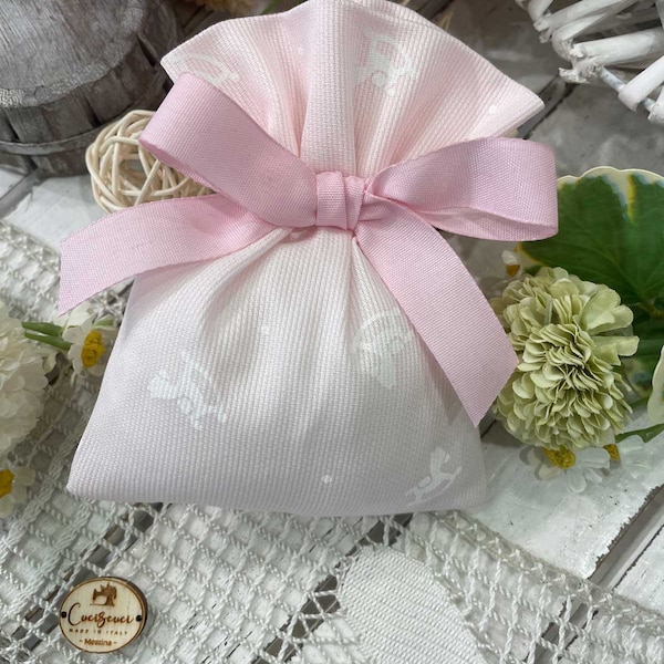 Mini sac tailleur rose avec chevaux à bascule