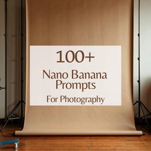 May include: A photography studio scene featuring a brown backdrop and a sign displaying "100+ Nano Banana Prompts For Photography." A camera is on a blue tripod. A brown leather sofa is visible in the background.