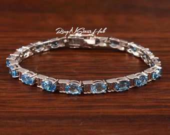 Swiss Blue Topaz Bracelet: Sterling Silver Oval Tennis Bracelet