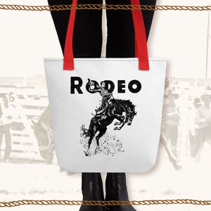 Patriotic Cowboy on Rodeo Horse Tote Bag by A Macarthur Gurmankin