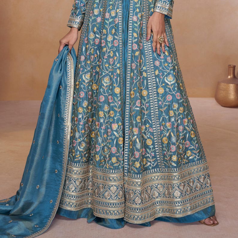 Model wearing the set in a vintage ball gown dress style with boho and Indian ethnic fusion