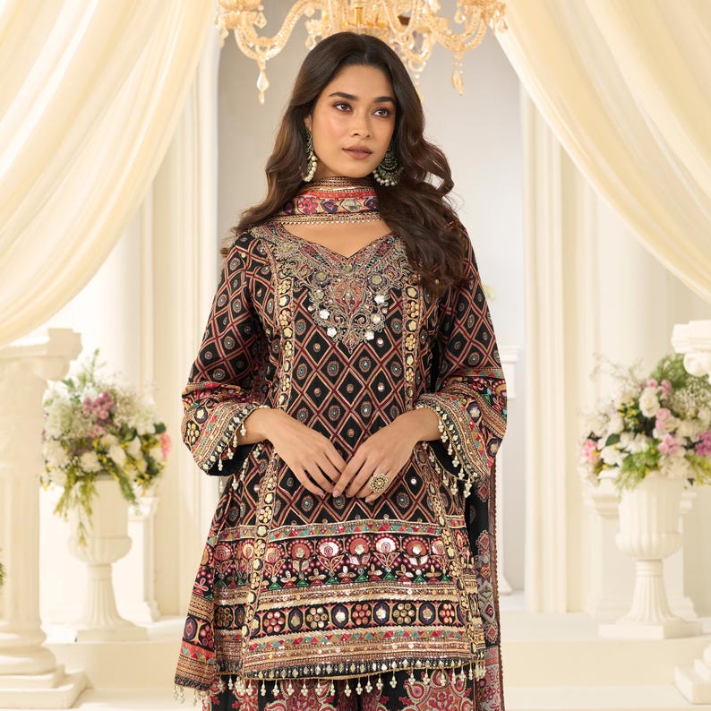 Close-up of the gota patti border and detailing on the sheer dupatta.