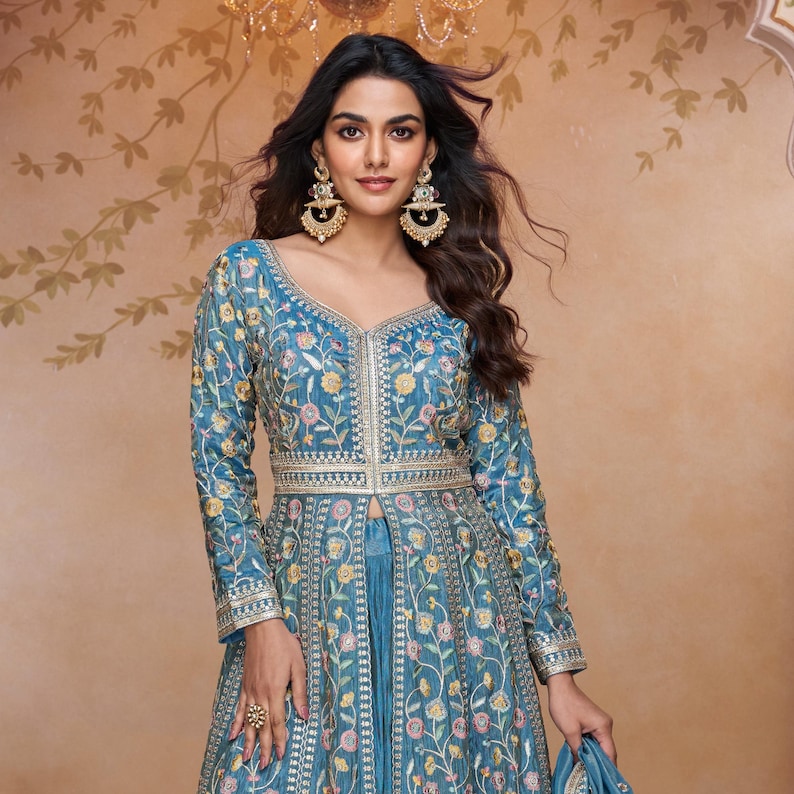 Flowing dupatta draped to showcase digital abstract floral motifs and intricate embellishments
