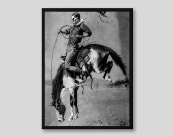 May include: A black and white photograph of a cowboy riding a bucking horse. The cowboy is wearing a hat and a long-sleeved shirt. The horse is rearing up on its hind legs.