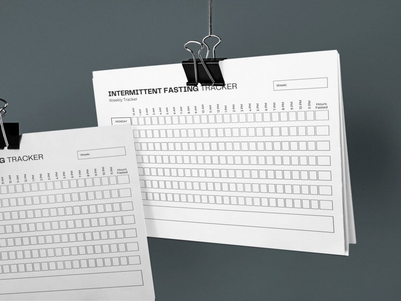 May include: Printable intermittent fasting tracker with a weekly layout. The tracker has a column for each day of the week and a row for each hour of the day. There is a space to write in the week number and the total hours fasted.