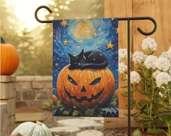 May include: A rectangular garden flag hanging on a black metal stand. The flag features a painting of a black cat sleeping on top of a large orange jack-o'-lantern. The background shows a dark blue night sky with yellow stars and a swirling moon.