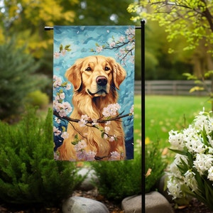 May include: A golden retriever dog with a soft, golden coat is surrounded by pink cherry blossoms. The dog is looking directly at the viewer with a gentle expression. The background is a blue sky with white clouds.