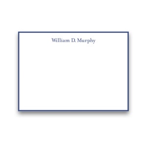 May include: A white card with a navy blue border. The text "William D. Murphy" is printed in navy blue at the top of the card.