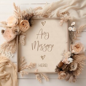 May include: A wooden frame with a beige background and the text "Any Message Here!" surrounded by dried flowers and pampas grass.