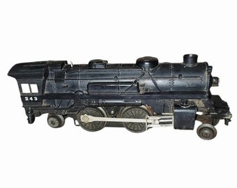 Locomotora de vapor Lionel 243 O27 negra de época, configuración 2-4-2.