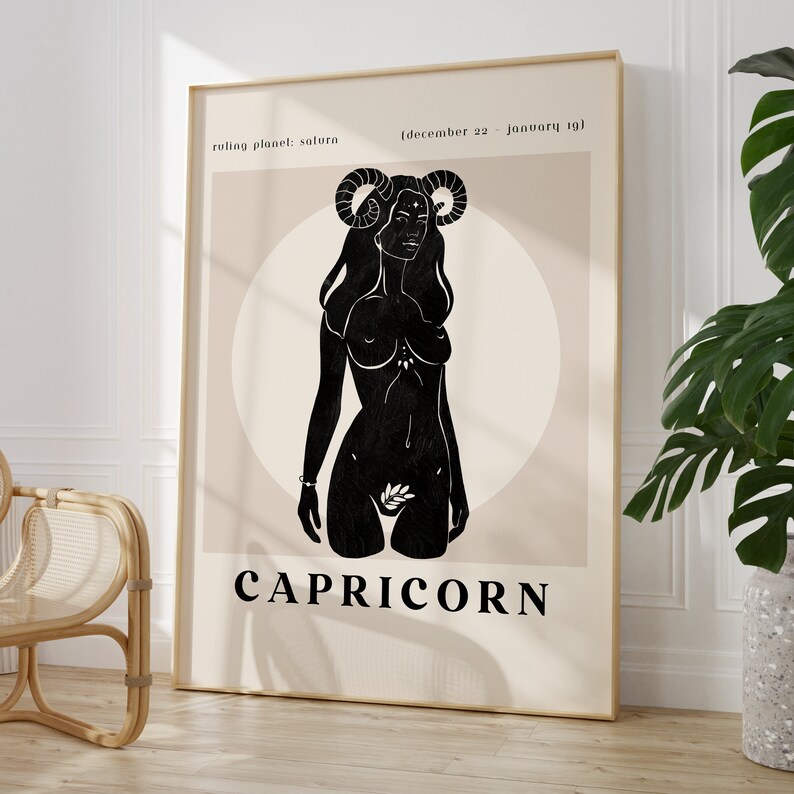 May include: A black and white illustration of a Capricorn zodiac sign. The illustration features a woman with horns and a goat tail. The text "Capricorn" is written below the illustration. The text "ruling planet: saturn" and "[december 22 - january 19]" is written above the illustration.