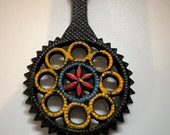 Vintage Round Cast Iron Trivet With Handpainted Floral Design Red Blue Yellow