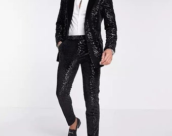 Black embroidered tuxedo jacket and trouser.