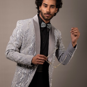 Grey pearl embroidered tuxedo jacket and trouser.