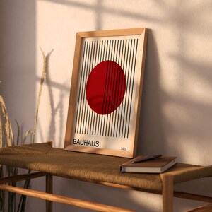 May include: A handmade wooden chopping board with a natural finish. The board has a live edge on one side and a rectangular shape. It's approx. 45 cm long and 30 cm wide.