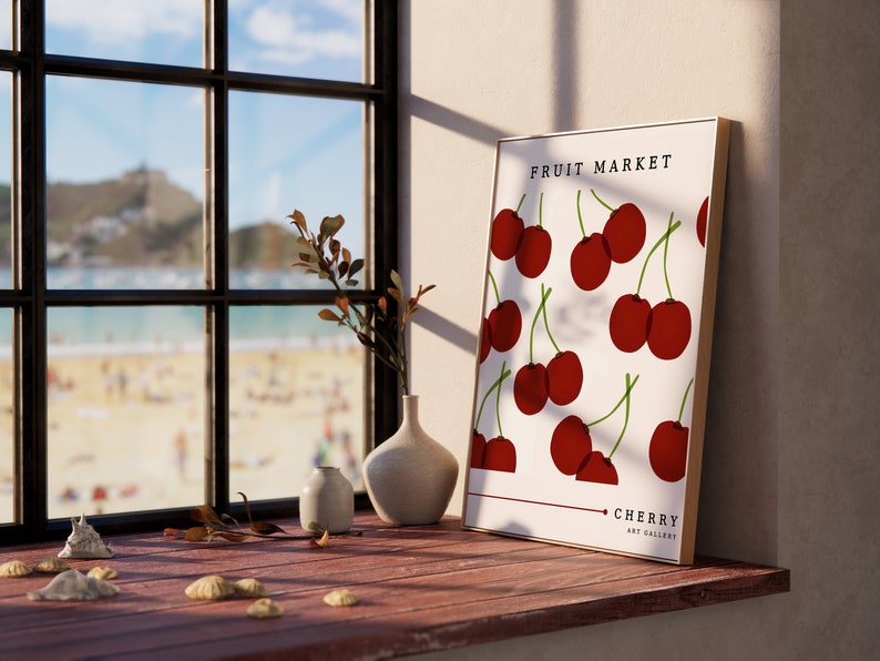 May include: A framed print with a white background and red cherries. The print says "Fruit Market" and "Cherry Art Gallery".