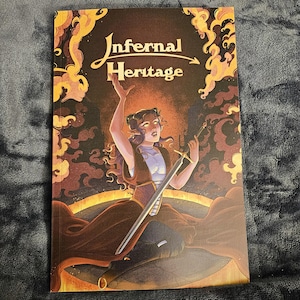 May include: A book cover featuring the title "Infernal Heritage" in a stylized font. The illustration depicts a woman with pointed ears, holding a sword, with a fiery background. The color palette includes shades of brown, orange, and purple.