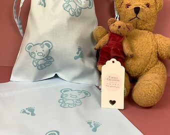 Handprinted cotton drawstring gift bag with patchwork teddy design.