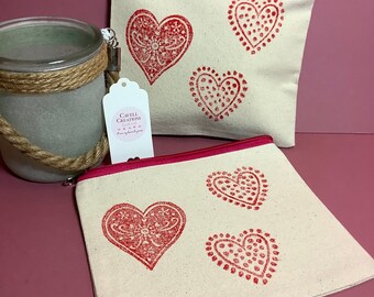 Handprinted cotton canvas zipped pouch/cosmetic bag with dotty heart design