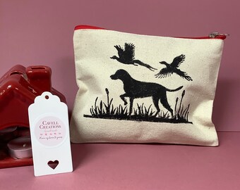 Handprinted cotton canvas zipped pouch/cosmetic bag with gun dog design.