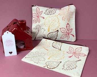 Hand printed fully lined zip pouch/cosmetic bag with Autumn leaves design