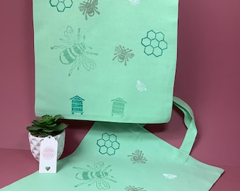 Handprinted cotton pastel colours tote bag with bee design.