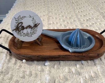 Exprimidor y colador de cítricos de plástico Foley vintage azul