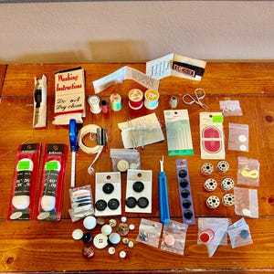 Vintage Lot of Sewing Notions Thread Spools Buttons Needles Elastic Tape Measures Etc.